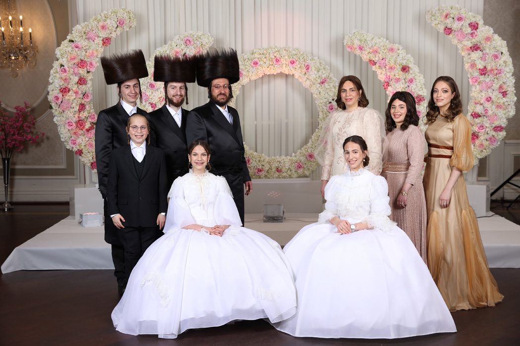Bride and groom added to a family photo: before retouching