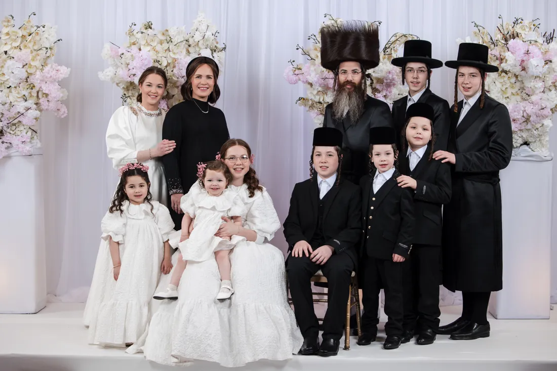 Couple added to a family photo: before