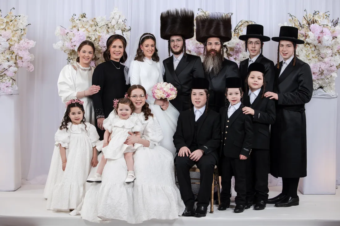 Couple added to a family photo: after